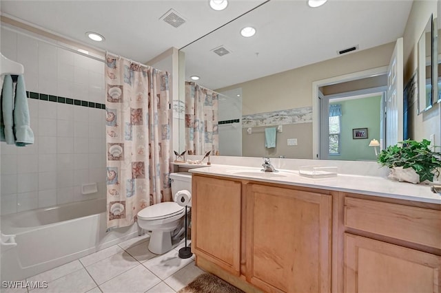 full bath with toilet, visible vents, vanity, tile patterned floors, and shower / bath combo