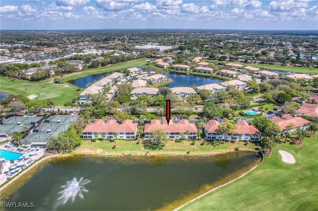 birds eye view of property with a residential view, view of golf course, and a water view