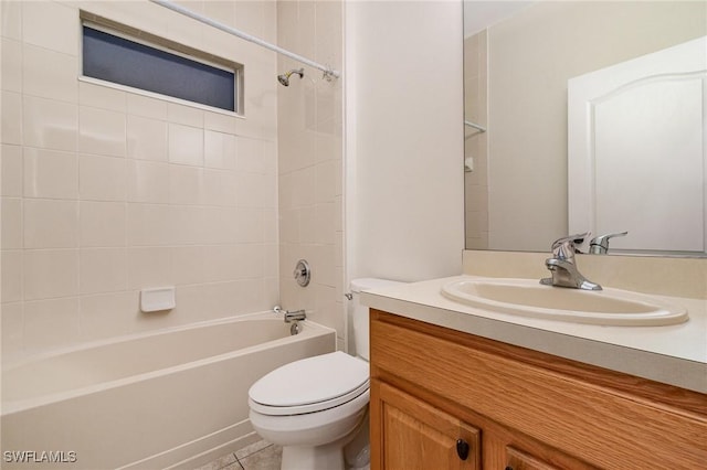 full bath with shower / washtub combination, tile patterned flooring, vanity, and toilet