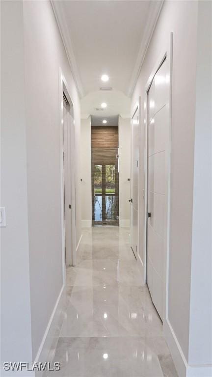 hallway with baseboards, marble finish floor, recessed lighting, and crown molding