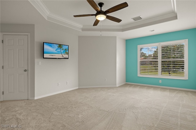 9325 La Bianco St, Estero, FL 33967 - empty room featuring a tray ceiling, carpet, visible vents, and crown molding