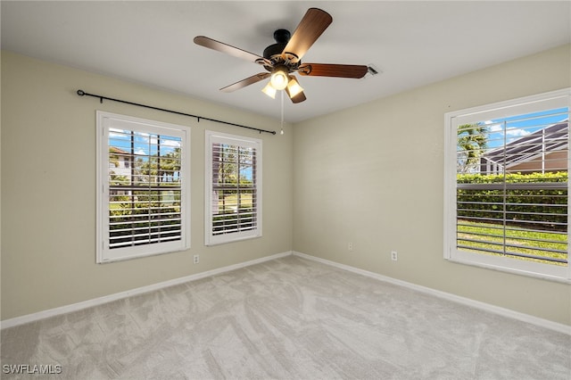 9325 La Bianco St, Estero, FL 33967 - empty room featuring baseboards, a ceiling fan, and light colored carpet