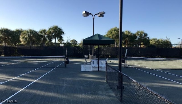 9325 La Bianco St, Estero, FL 33967 - view of tennis court with fence