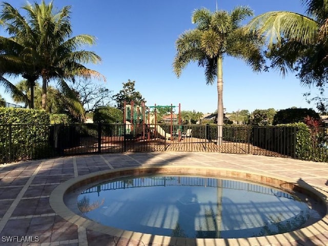 9325 La Bianco St, Estero, FL 33967 - view of swimming pool featuring playground community and fence