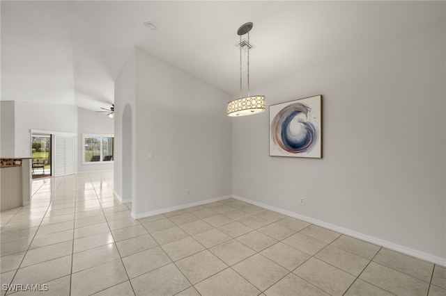 9325 La Bianco St, Estero, FL 33967 - unfurnished room with lofted ceiling, light tile patterned floors, baseboards, and a ceiling fan
