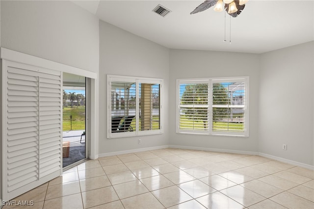 9325 La Bianco St, Estero, FL 33967 - unfurnished room with light tile patterned floors, ceiling fan, visible vents, baseboards, and vaulted ceiling