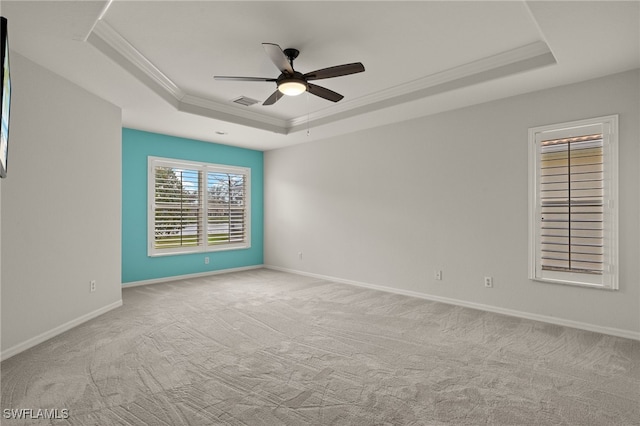 9325 La Bianco St, Estero, FL 33967 - carpeted spare room with ornamental molding, a tray ceiling, ceiling fan, and baseboards