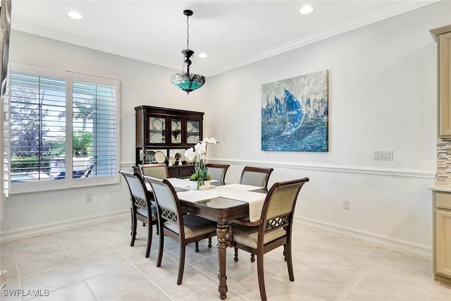 dining area featuring light tile patterned floors, baseboards, crown molding, and recessed lighting