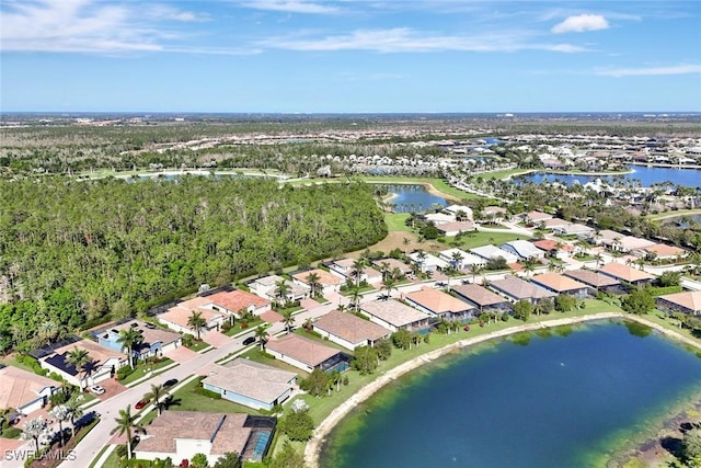 aerial view featuring a water view and a residential view