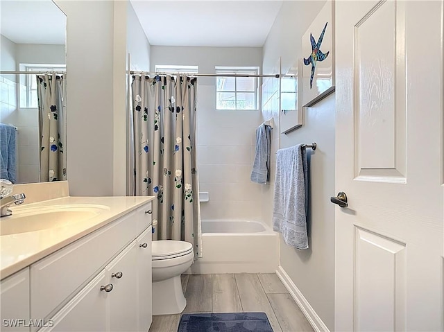 full bathroom with vanity, toilet, shower / bath combo, and wood finish floors