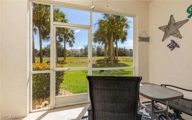 sunroom with plenty of natural light