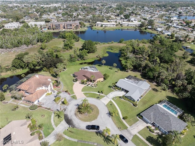 bird's eye view with a water view and a residential view