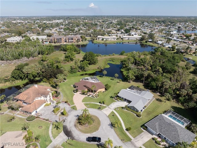 bird's eye view with a residential view and a water view