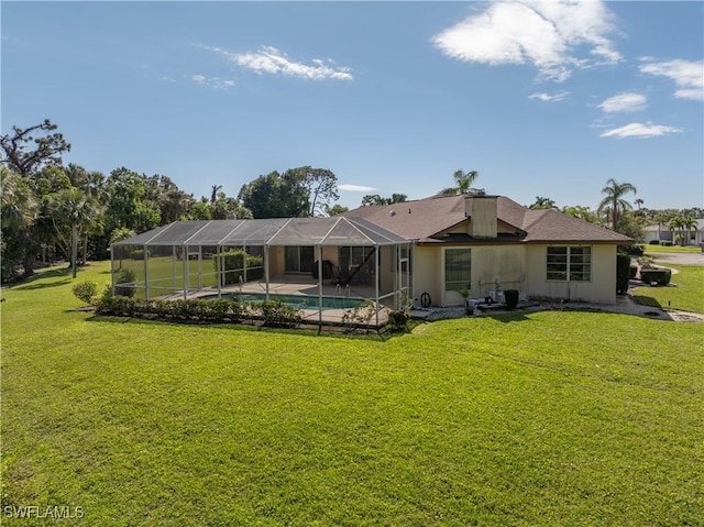 rear view of property with glass enclosure, an outdoor pool, a lawn, stucco siding, and a patio area