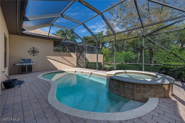 view of pool featuring a patio, a grill, a lanai, and a pool with connected hot tub