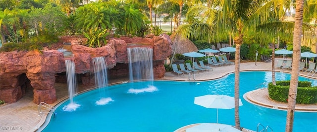 community pool featuring a patio area