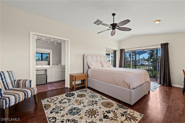 bedroom with lofted ceiling, access to outside, wood finished floors, and visible vents