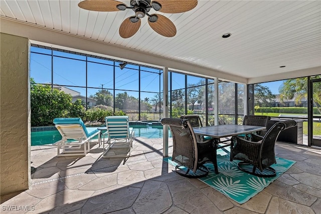 sunroom featuring a swimming pool and wood ceiling