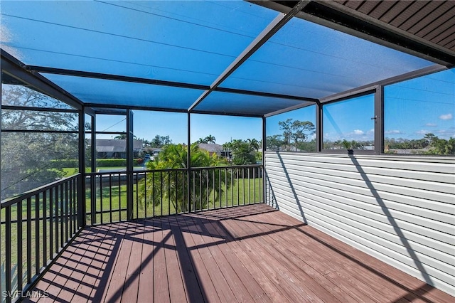 wooden terrace featuring a lanai