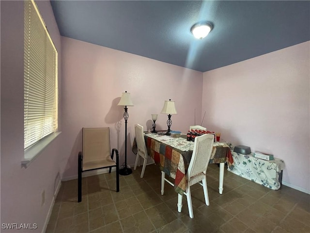 dining room with baseboards