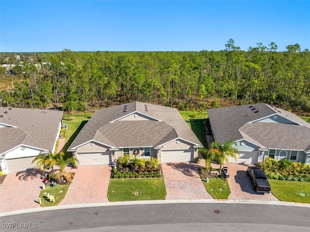 aerial view featuring a view of trees