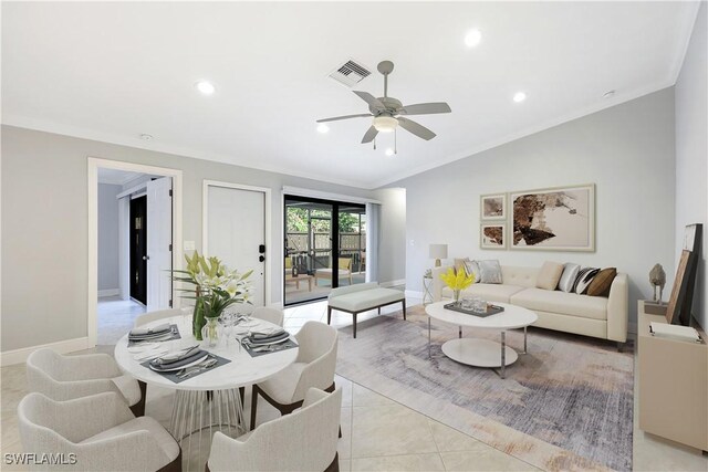 living area featuring baseboards, visible vents, lofted ceiling, crown molding, and recessed lighting