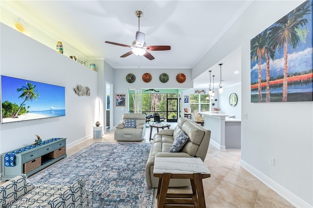 8732 Banyan Bay Blvd, Fort Myers, FL 33908 - living room featuring a ceiling fan, light tile patterned floors, and ornamental molding