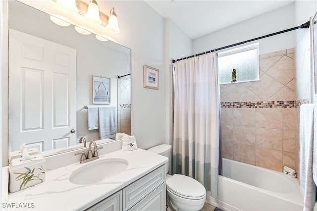 bathroom featuring shower / bath combo, vanity, and toilet