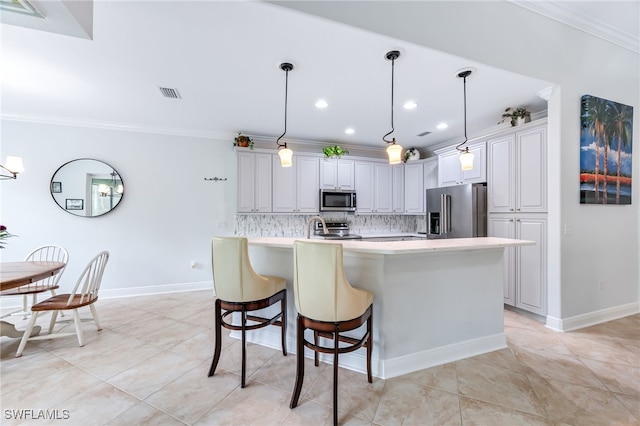8732 Banyan Bay Blvd, Fort Myers, FL 33908 - kitchen featuring stainless steel appliances, backsplash, crown molding, light tile patterned floors, and light countertops