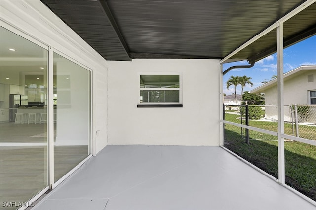 view of patio / terrace featuring fence