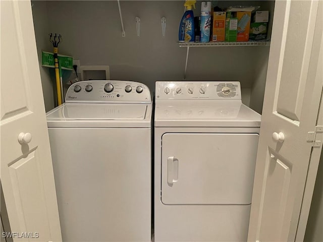 laundry area featuring laundry area and washer and clothes dryer