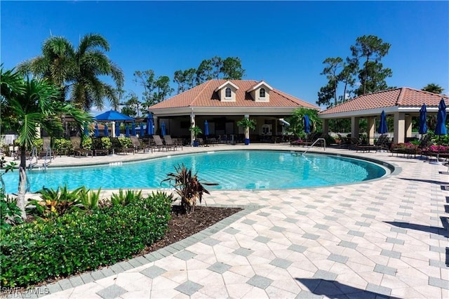 community pool with a patio