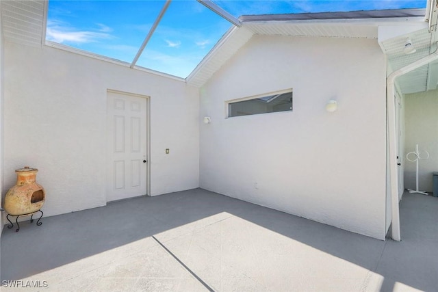 view of patio / terrace with a lanai