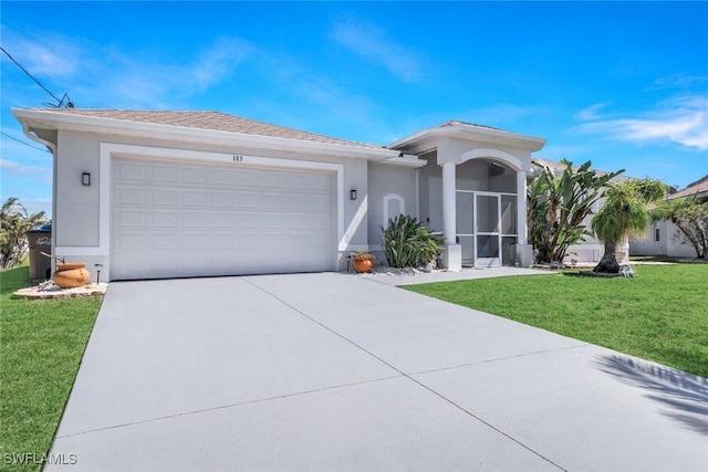 single story home with a garage, stucco siding, concrete driveway, and a front lawn