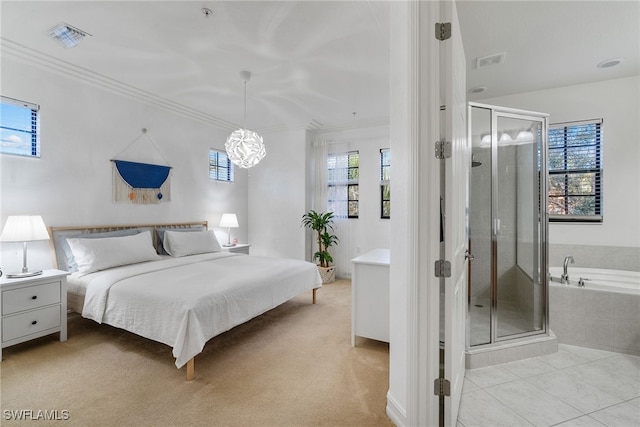 carpeted bedroom featuring a chandelier, tile patterned flooring, visible vents, and crown molding