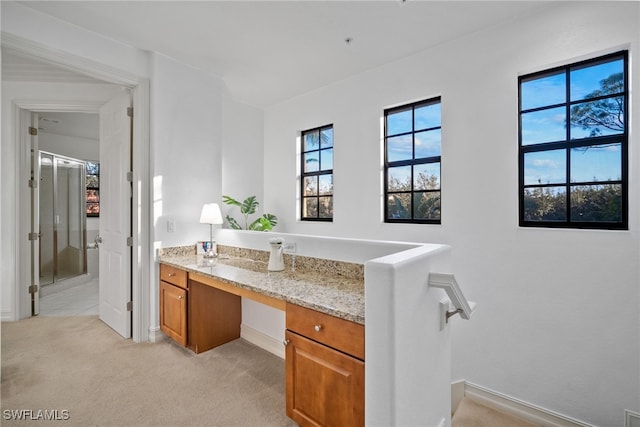 full bath featuring a shower stall and vanity