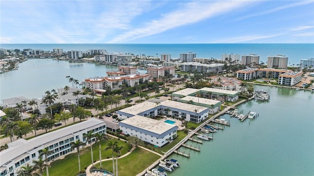 bird's eye view with a water view and a city view