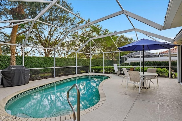 view of swimming pool with a fenced in pool, glass enclosure, grilling area, fence, and a patio area