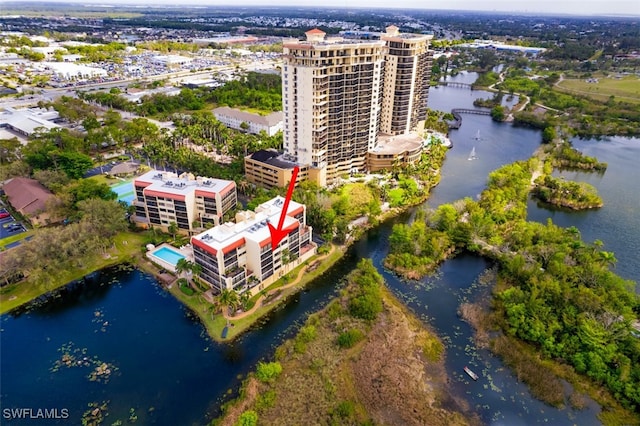 bird's eye view featuring a view of city and a water view