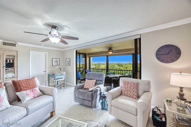 living area with baseboards, ceiling fan, visible vents, and crown molding