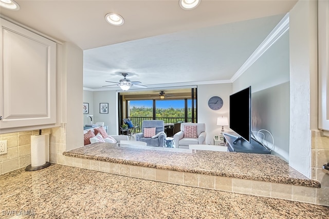 living room with recessed lighting, a ceiling fan, and crown molding