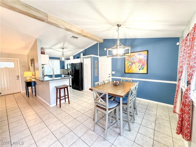 dining space featuring baseboards, visible vents, vaulted ceiling with beams, an inviting chandelier, and light tile patterned flooring