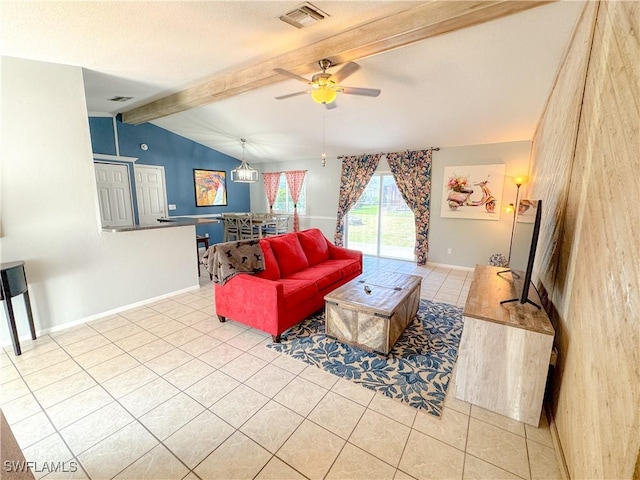 living room with lofted ceiling with beams, tile patterned flooring, visible vents, baseboards, and a ceiling fan