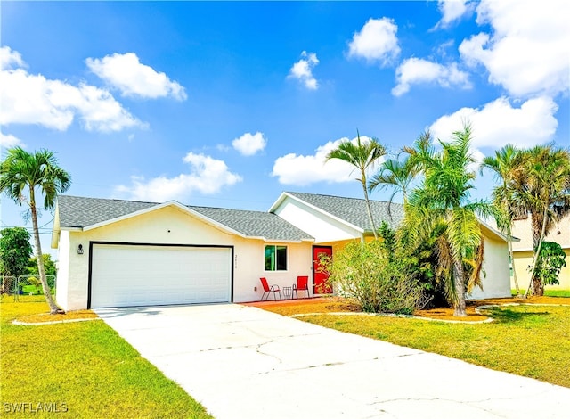 ranch-style house featuring a garage, concrete driveway, roof with shingles, a front yard, and stucco siding