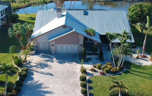 drone / aerial view featuring a water view