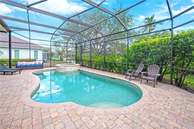 view of swimming pool with a patio, a lanai, and a pool with connected hot tub