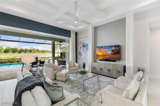 tiled living room featuring a ceiling fan, beam ceiling, coffered ceiling, and baseboards