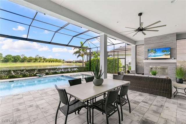 view of patio with an outdoor pool, a lanai, ceiling fan, and an outdoor living space with a fireplace