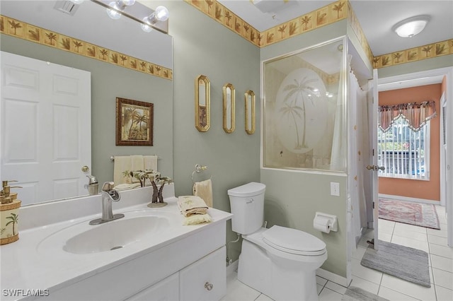 full bathroom featuring vanity, toilet, and tile patterned floors