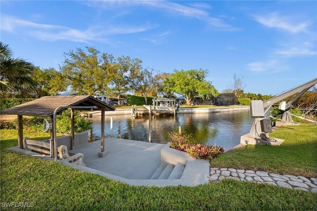 surrounding community with a water view, a yard, and a boat dock